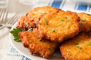 Homemade Traditional Potato Pancake Latke on a Background